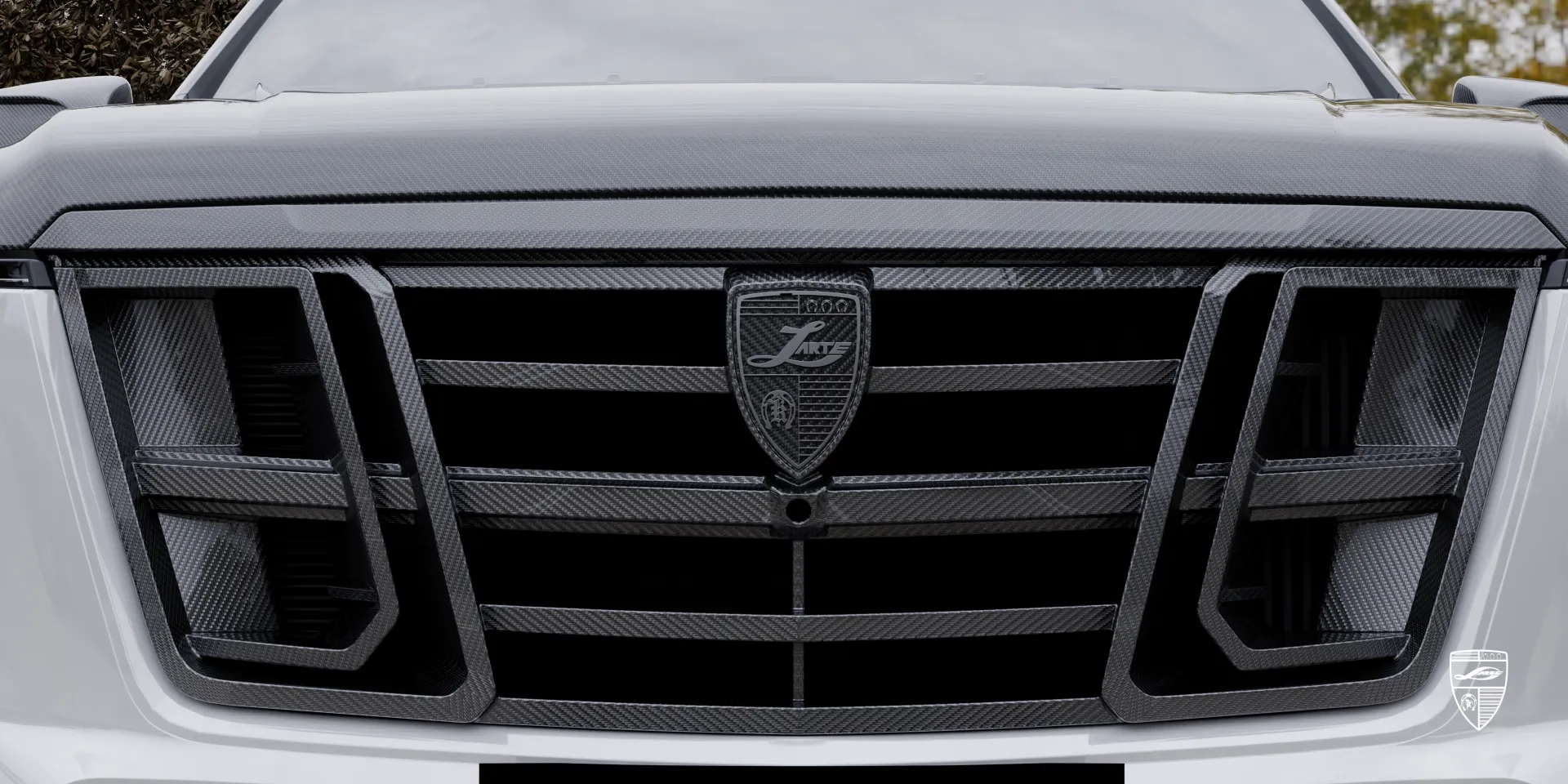 Крупный план карбоновых деталей Escalade‑V: текстурированное плетение и высокоточная отделка